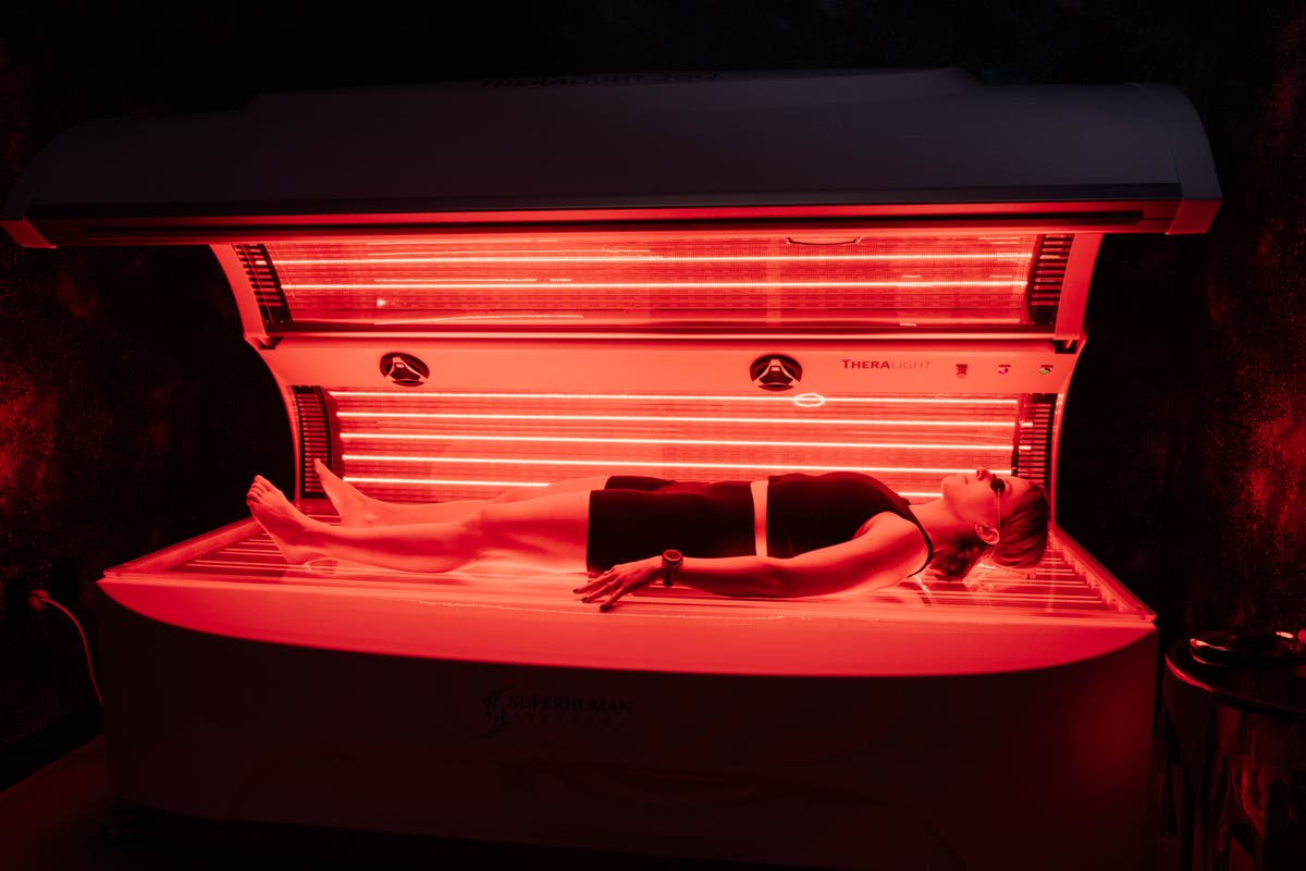 Red light therapy bed in serene treatment room