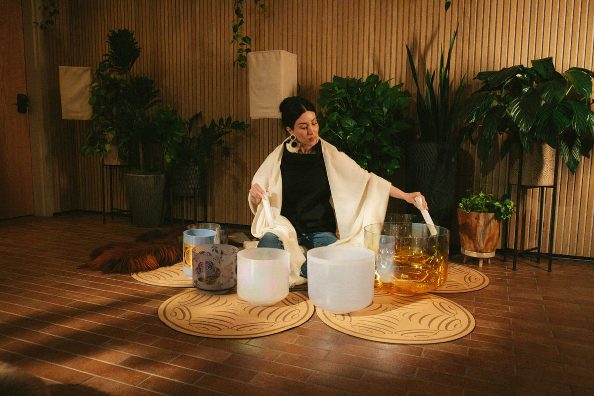 Crystal bowls and gongs arranged for a sound bath