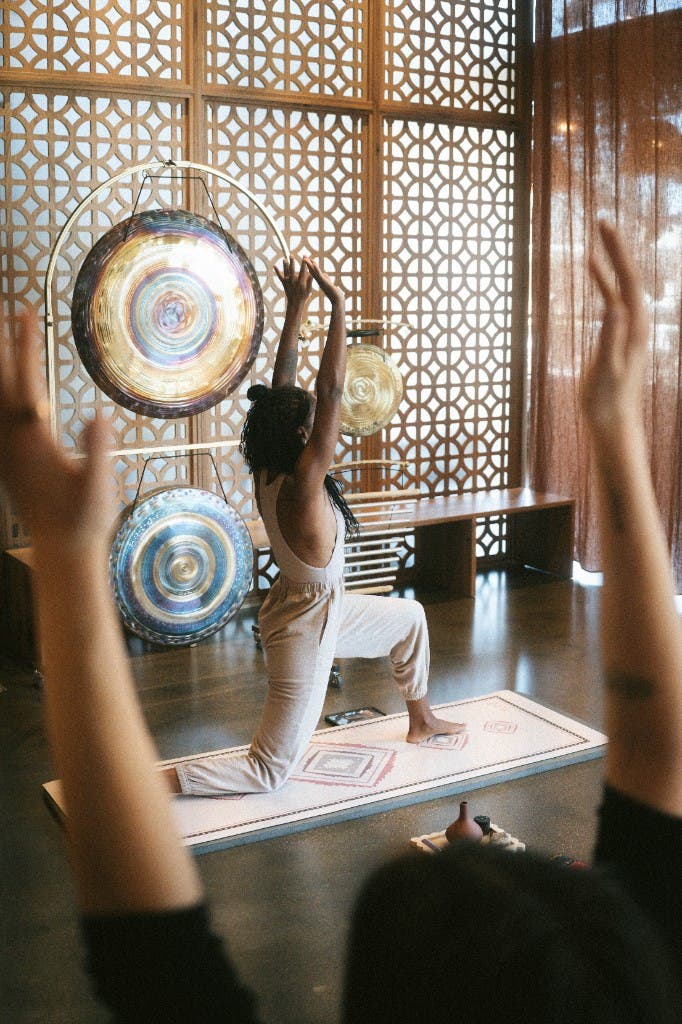 Yoga class at Sacred Society with gong instruments
